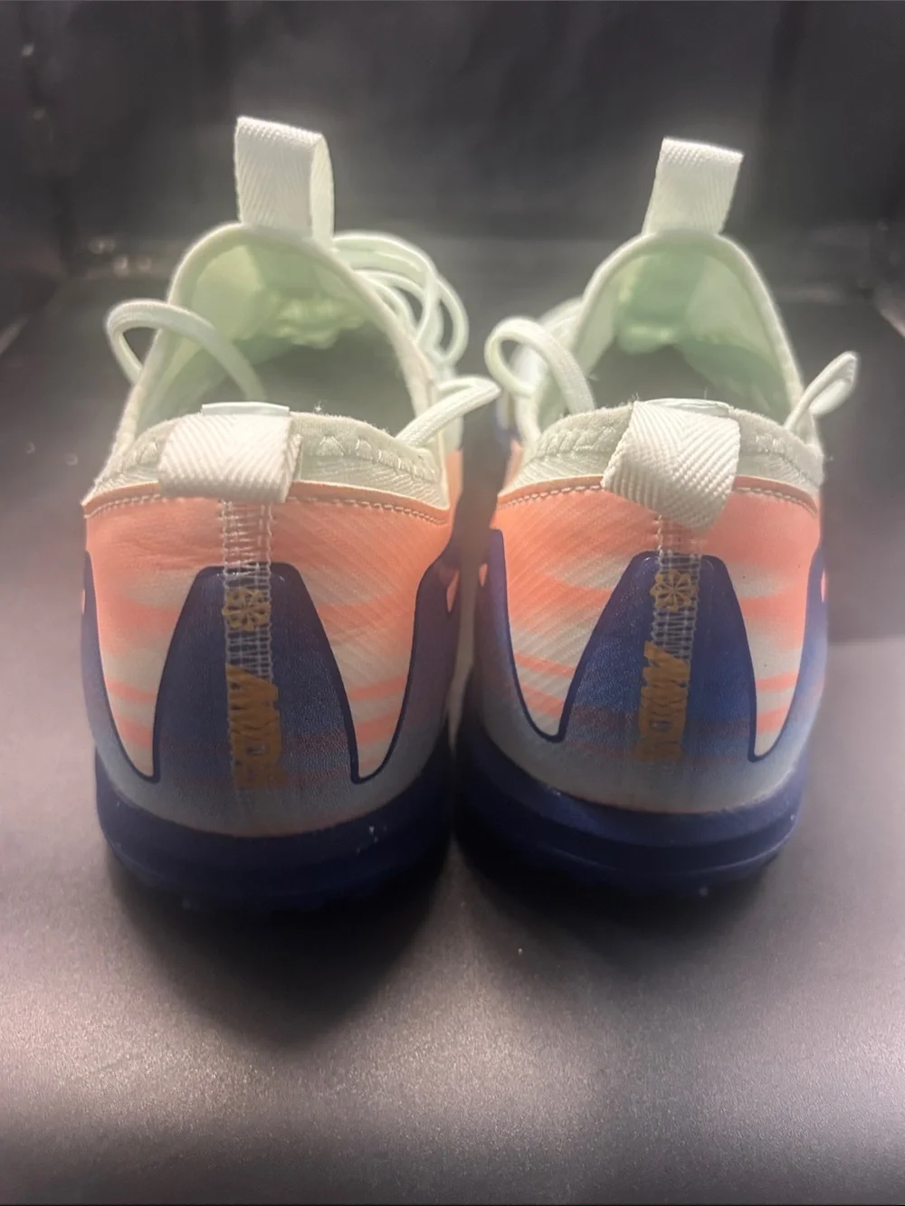 Nike Air Zoom Light Mint Soccer Shoes with Yellow Swoosh and Pastel Heel Accents